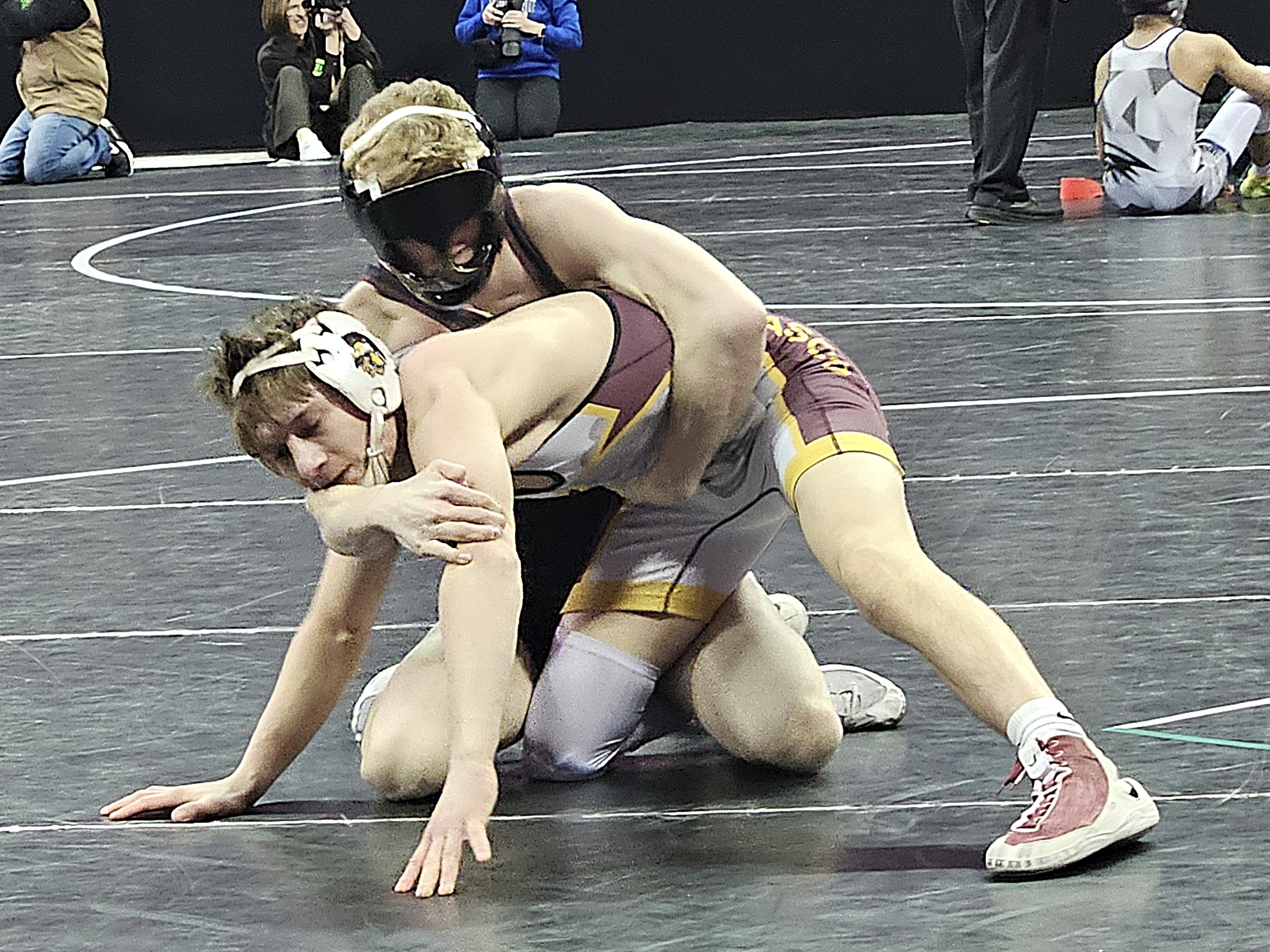 Holmen sophomore Nathan Henderson wrestles for third place at the Kohl Center in Madison. -- TODD SOMMERFELDT PHOTO