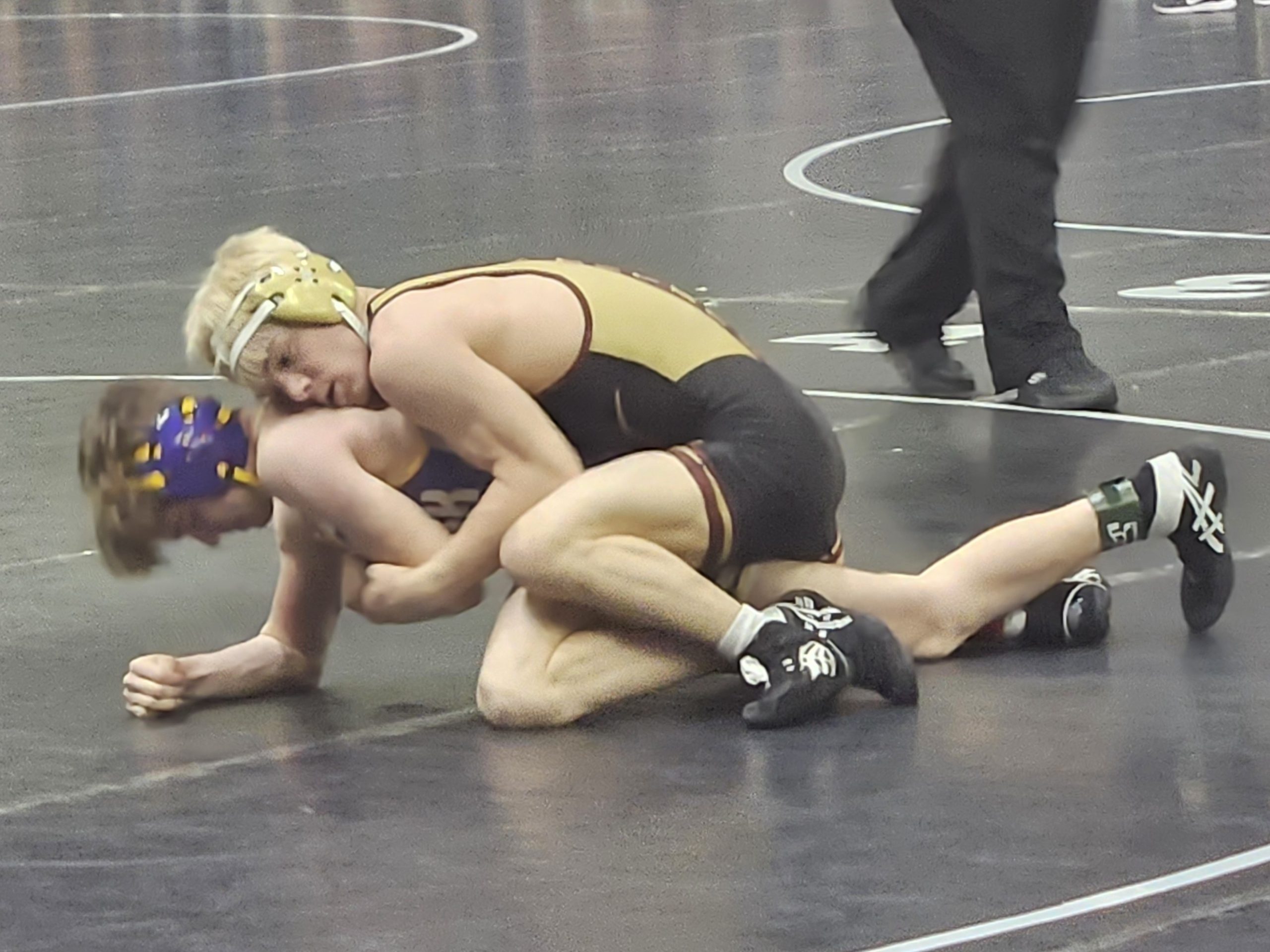 G-E-T/Melrose-Mindoro senior Koda Purney controls his 120-pound match during his team's Division 2 quarterfinal win over Denmark at the WIAA team state wrestling tournament on Friday. -- TODD SOMMERFELDT PHOTO