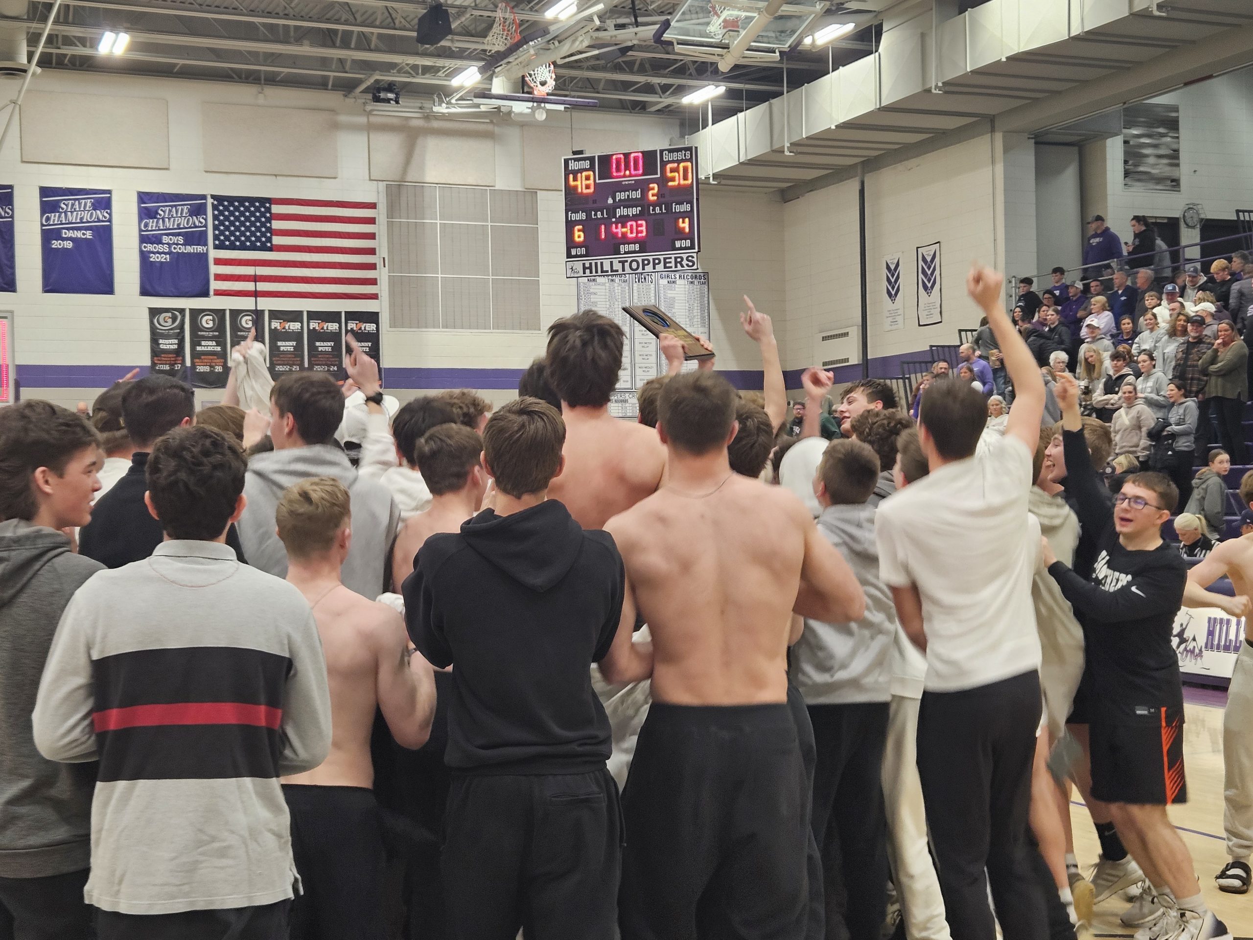 West Salem students join the boys basketball team to celebrate a WIAA Division 2 regional championship Saturday at Onalaska. -- TODD SOMMERFELDT PHOTO