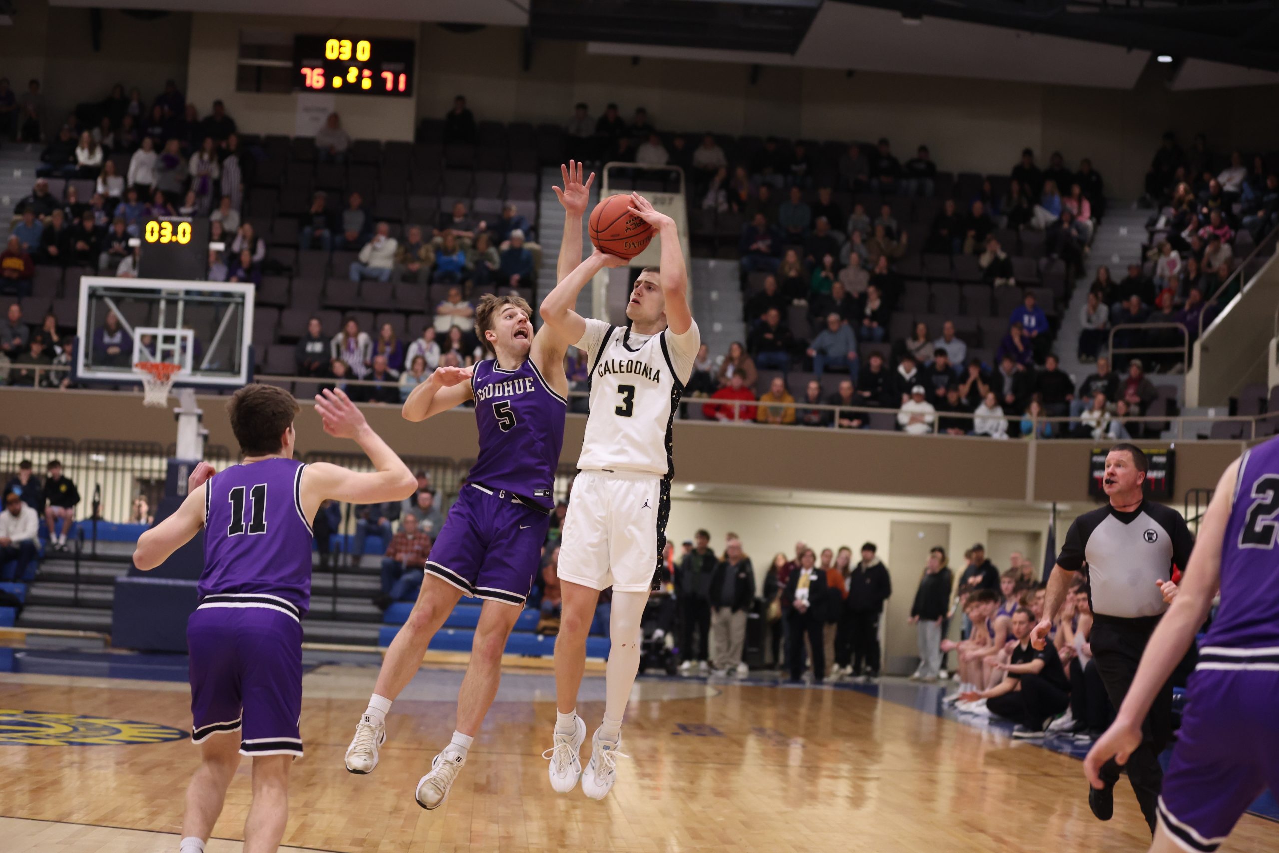 Caledonia sophomore Grant King makes a late shot during the Warriors' MSHSL Section 1AA championship game against Goodhue in Rochester. -- CRAIG JOHNSON PHOTO