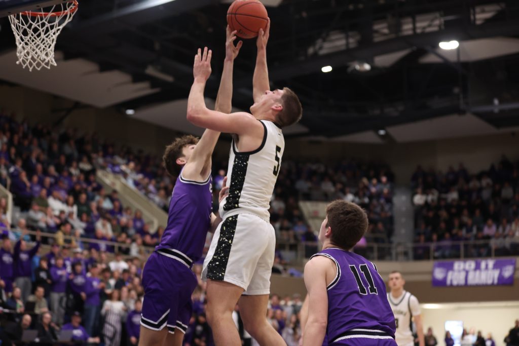 Caledonia junior Coby Hammell puts up a shit during Thursday's MSHSL Section 1AA championship game against Goodhue. -- CRAIG JOHNSON PHOTO