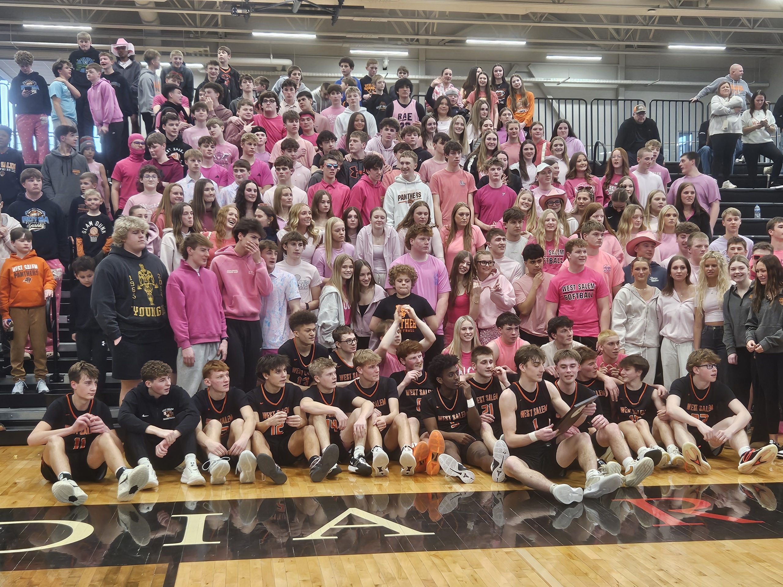 The West Salem boys basketball team celebrates its WIAA Division 2 sectional championship with fans. -- TODD SOMMERFELDT PHOTO