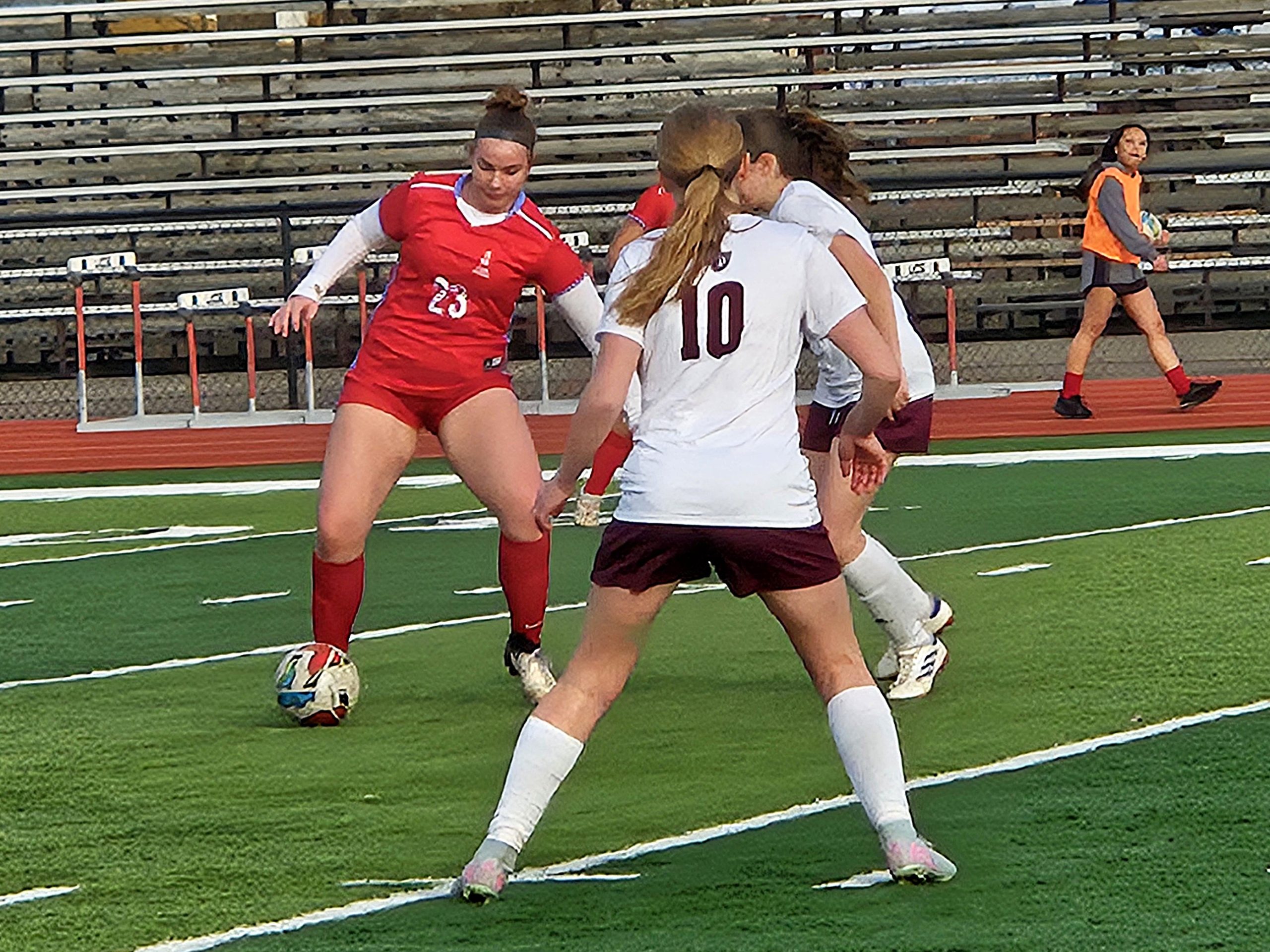 Logan/Luther's Josie Ryan tries to advance the ball during a game against Prairie du Chien. -- TODD SOMMERFELDT PHOTO