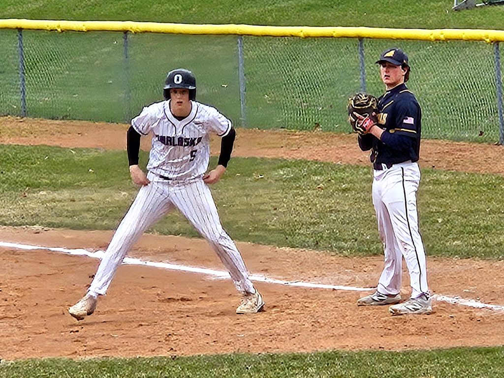 Onalaska's Ian Kowal gets a lead from first base during Wednesday's game against Aquinas. -- TODD SOMMERFELDT PHOTO