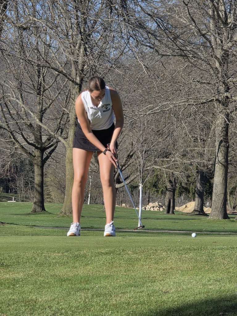Caledonia's Hayden Harms putts during her round of 39 in a win over Winona Cotter on Thursday. -- SUBMITTED PHOTO