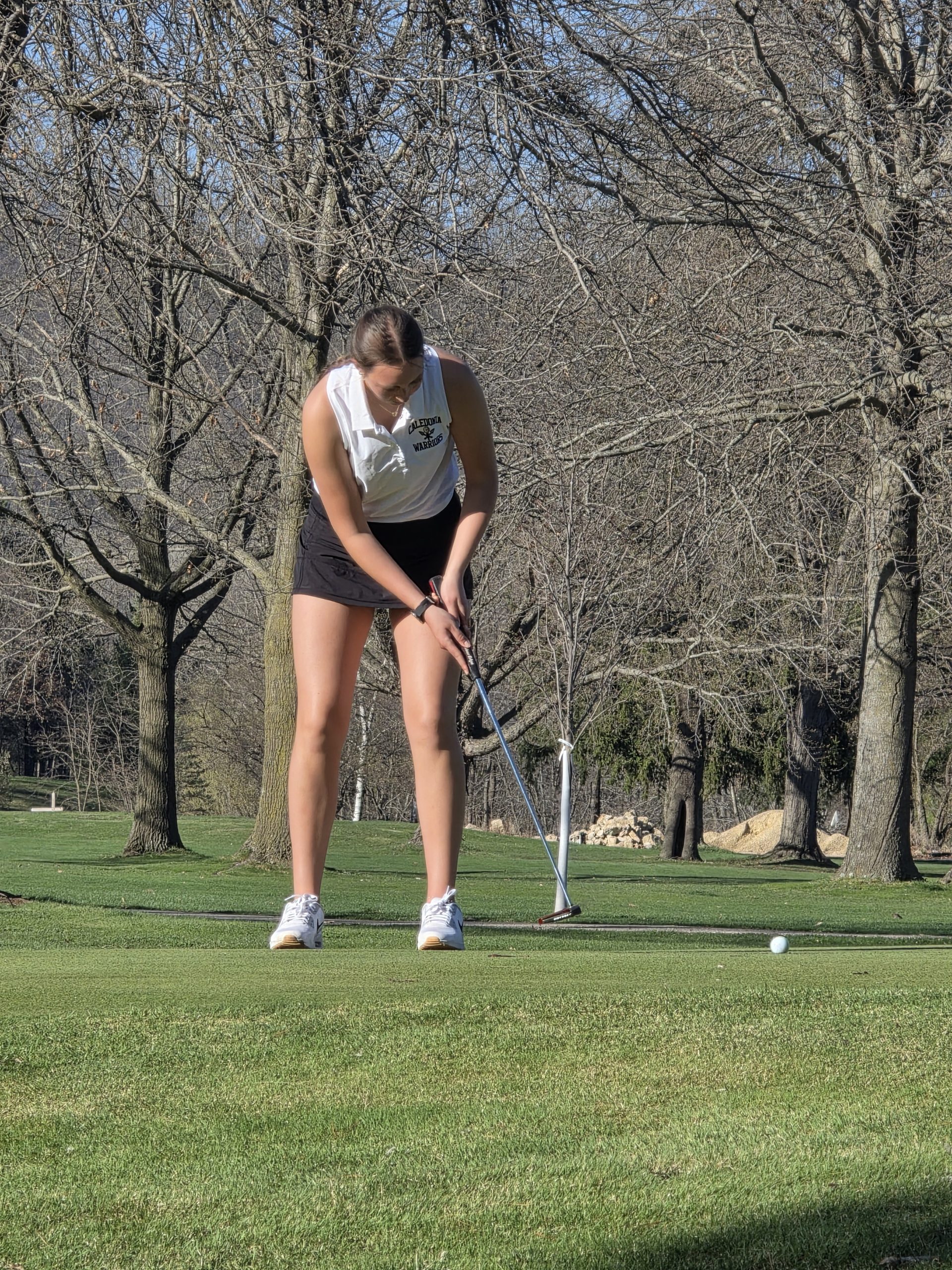 Caledonia's Hayden Harms putts during her round of 39 in a win over Winona Cotter on Thursday. -- SUBMITTED PHOTO