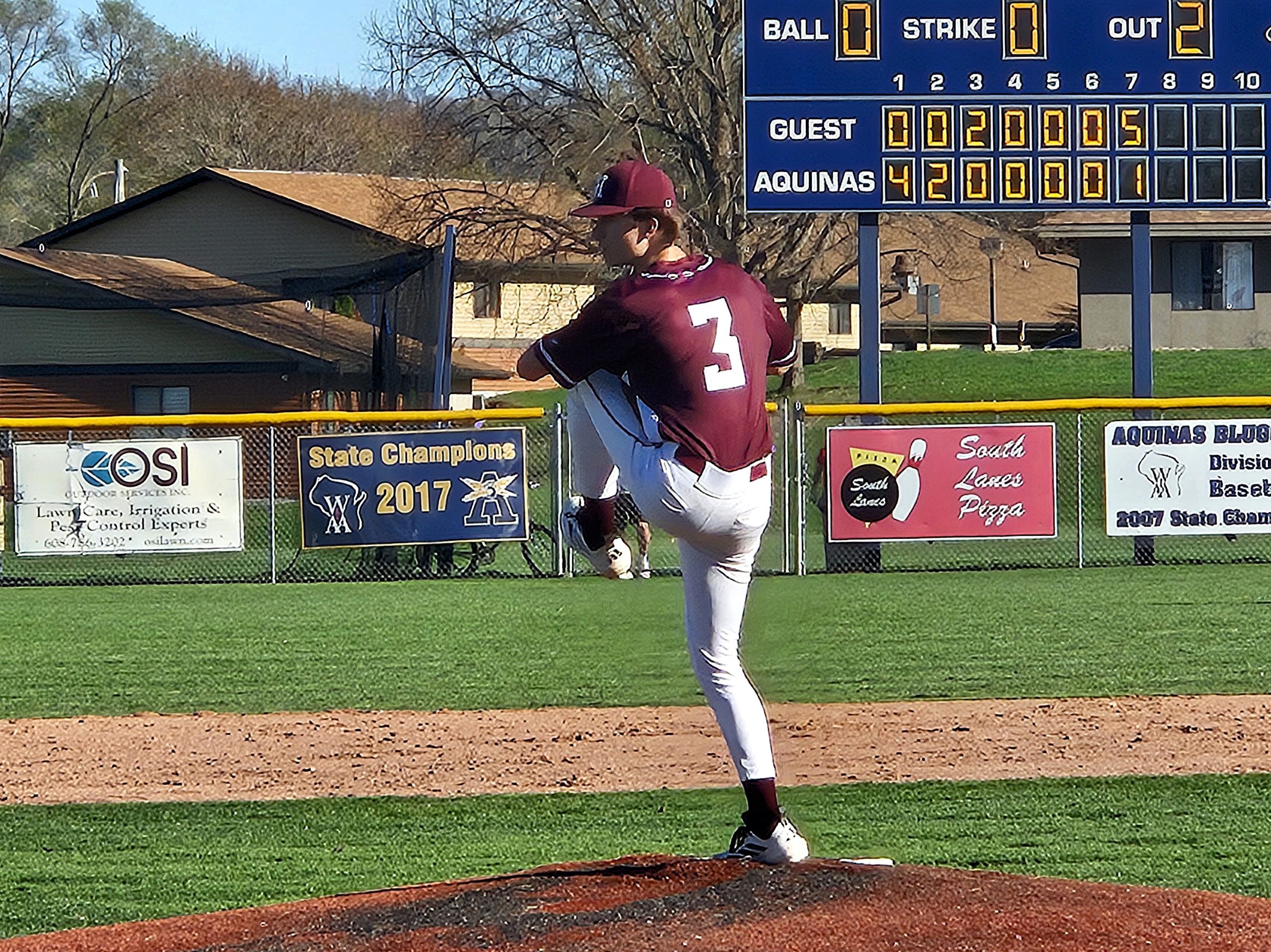 Holmen's Colton Wucki throws a pitch during Thursday's MVC baseball game against Aquinas. -- TODD SOMMERFELDT PHOTO