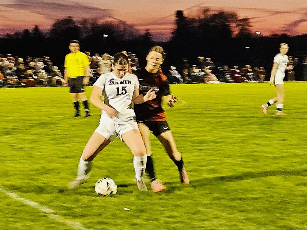Holmen's Layni Wood and West Salem's Mia Lehman battle for the soccer ball during an MVC game on Tuesday. -- TODD SOMMERFELDT PHOTO