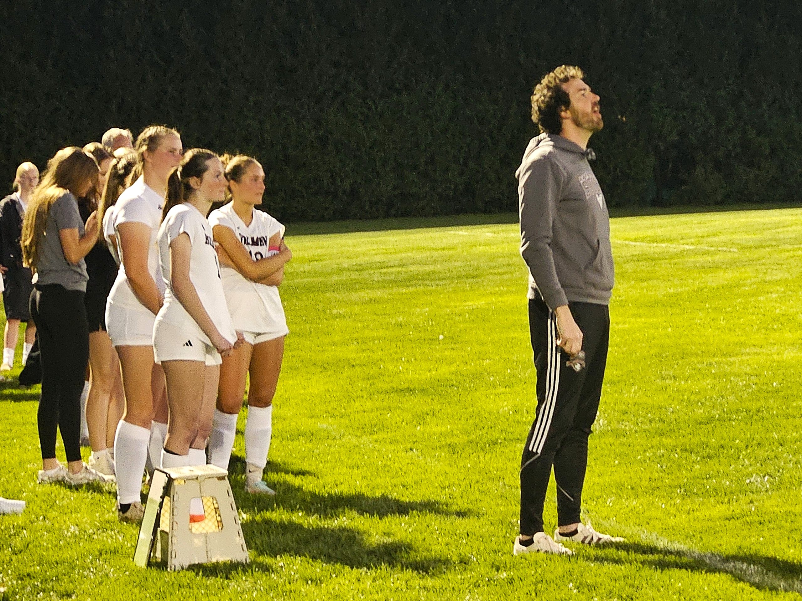 Holmen girls soccer coach Nick Schellenger shouts instructions to his team as his players watch the actin against West Salem. -- TODD SOMMERFELDT PHOTO