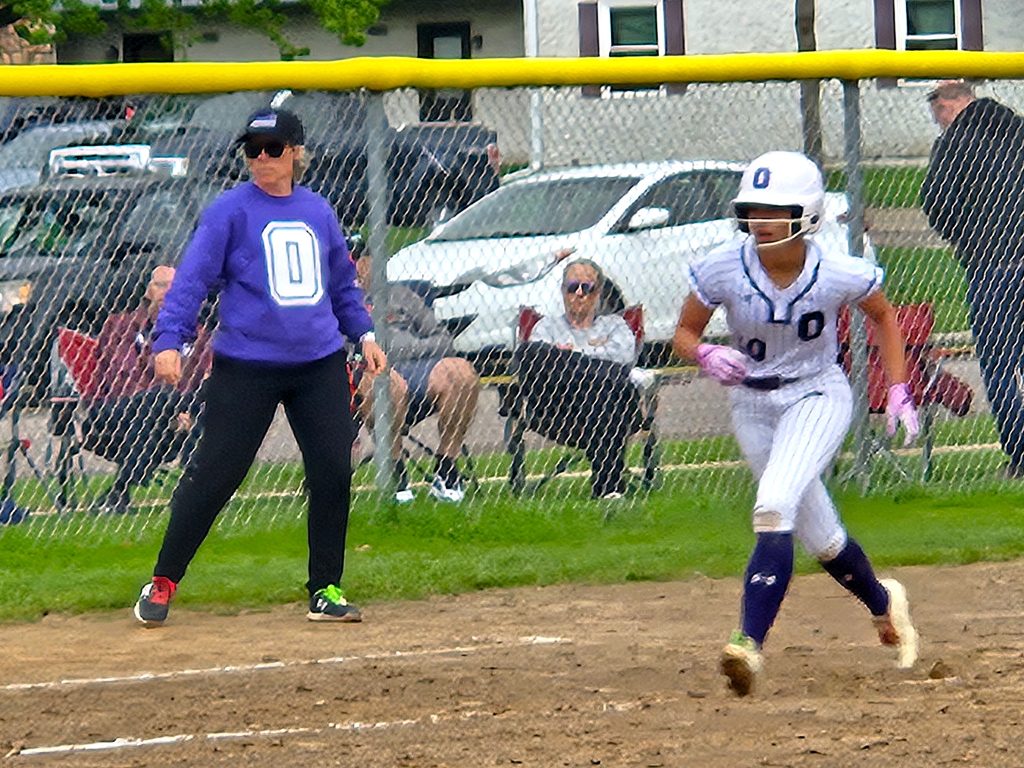Onalaska's Zoe Lichty waits for the chance to score from third base during Monday's softball game against visiting Central. -- TODD SOMMERFELDT PHOTO 