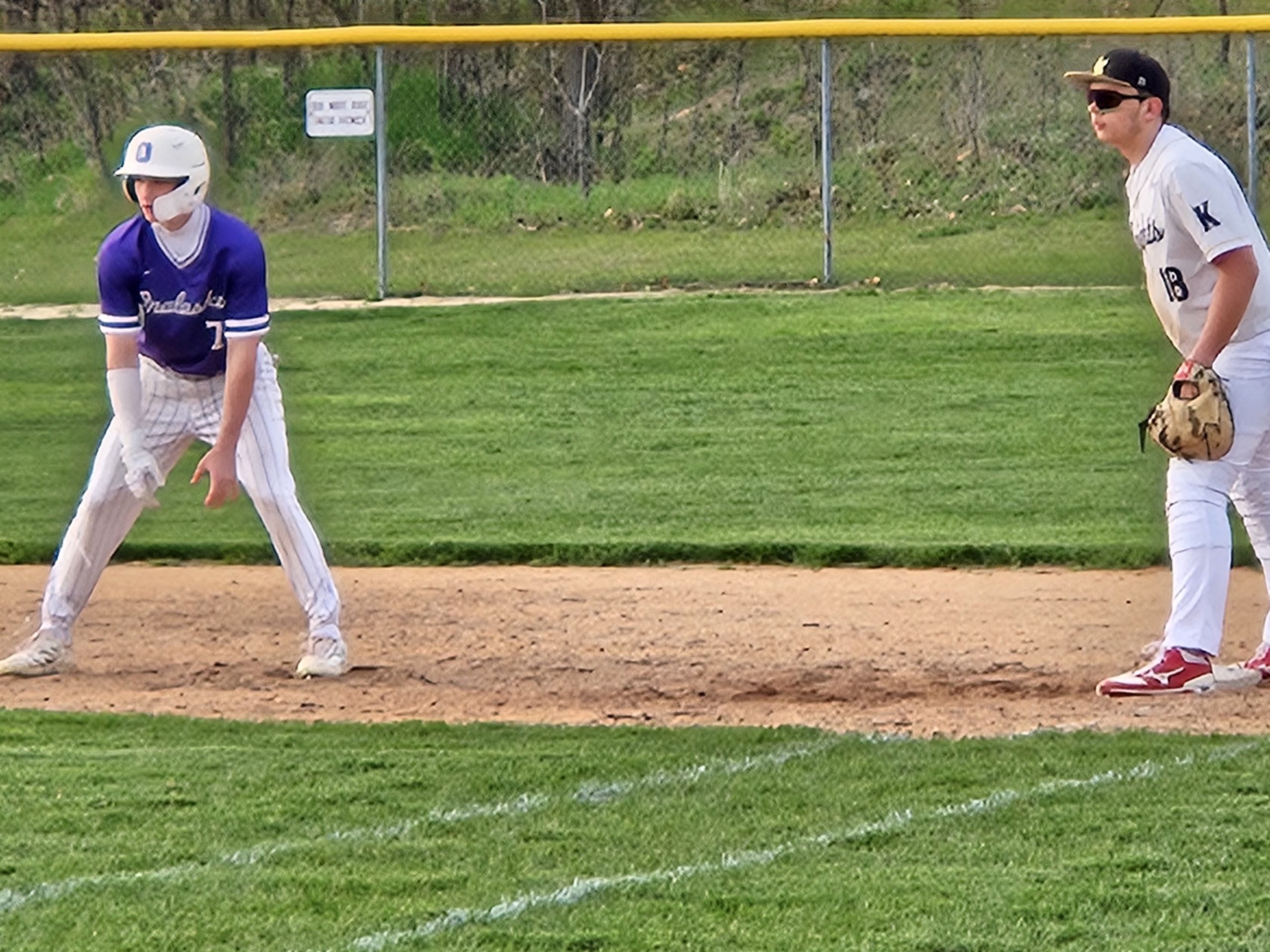 Onalaska's Sage Wieman gets a lead from first base after reaching safely in Tuesday's win at Luther. -- TODD SOMMERFELDT PHOTO