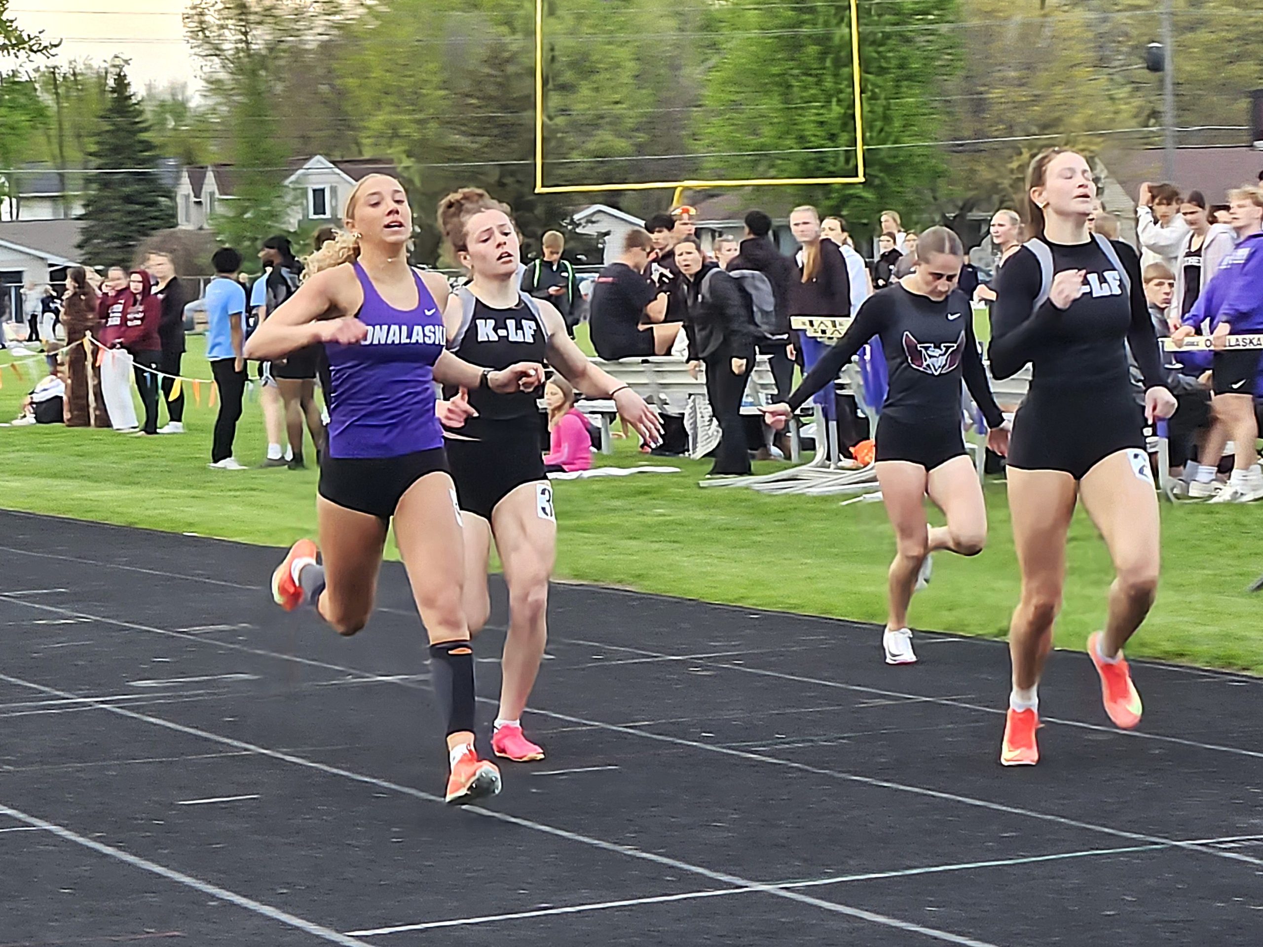 Onalaska senior Makena McGarry reaches the finish line in the 200 at Tuesday's Onalaska Open. -- TODD SOMMERFELDT OPEN