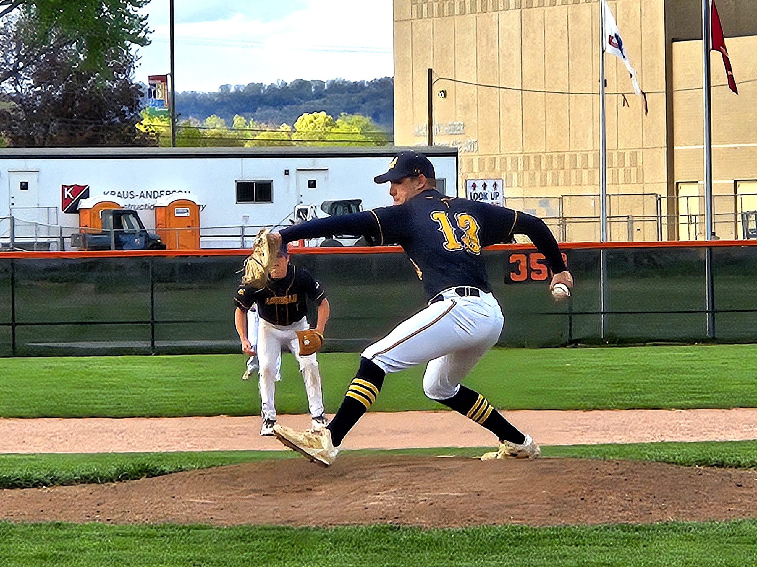 Landon Teachout throws a pitch for Aquinas during a game against West Salem. -- TODD SOMMERFELDT PHOTO