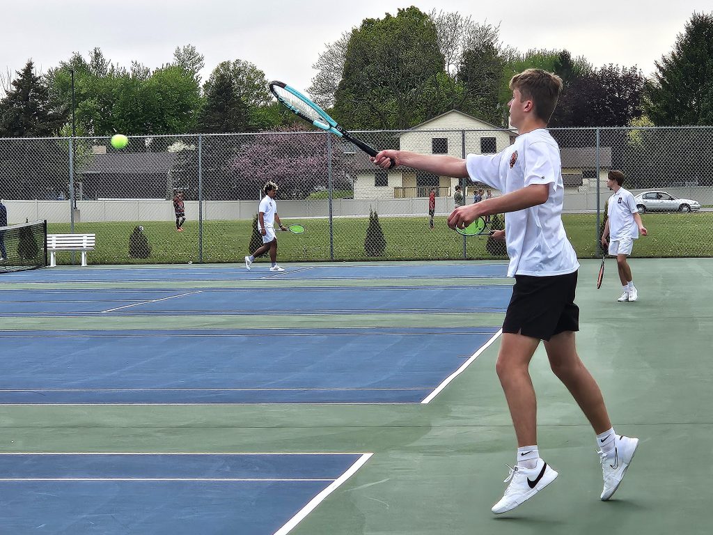 West Salem's Evan Urbanek returns a shot during his No 1 singles match against Onalaska on Monday. -- TODD SOMMERFELDT PHOTO