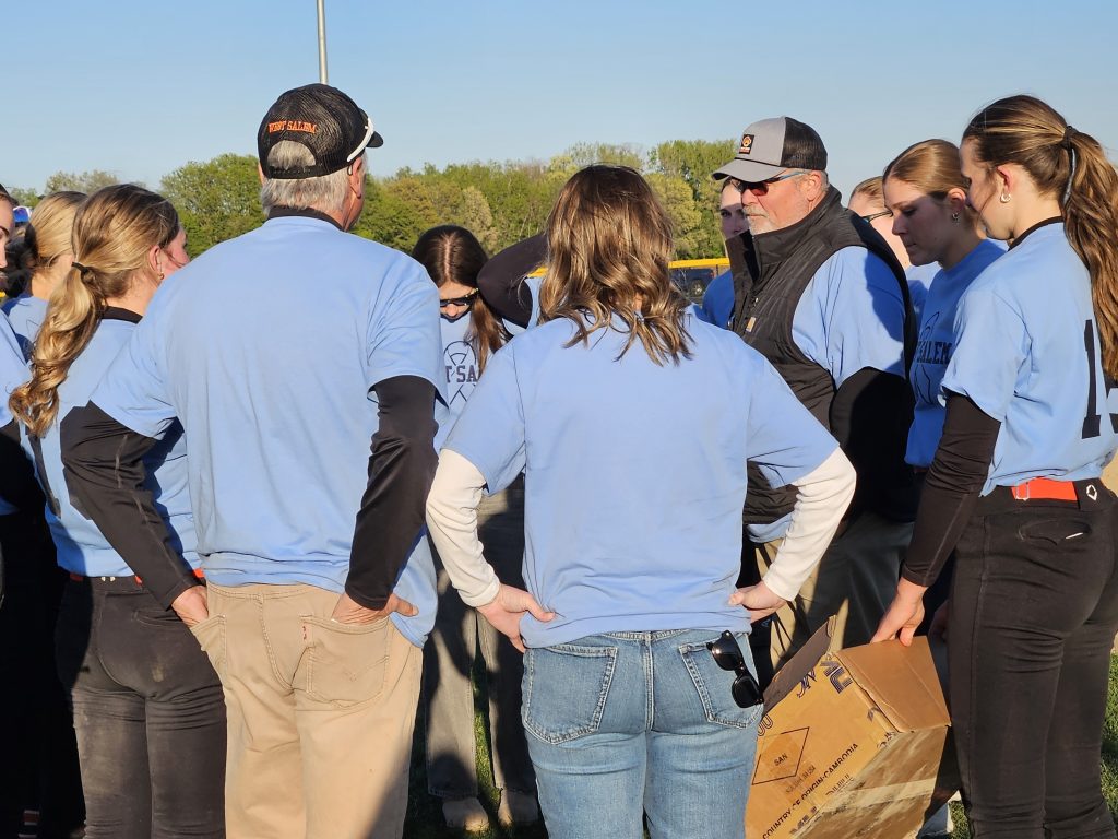 West Salem softball coach Brian Babiash talks to his team after winning its third straight Coulee Conference championship on Thursday. -- TODD SOMMERFELDT PHOTO