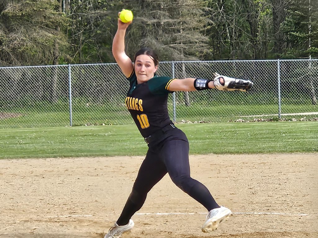 Melrose-Mindoro's Bella Rozek unloads a pitch against Aquinas. -- TODD SOMMERFELDT PHOTO