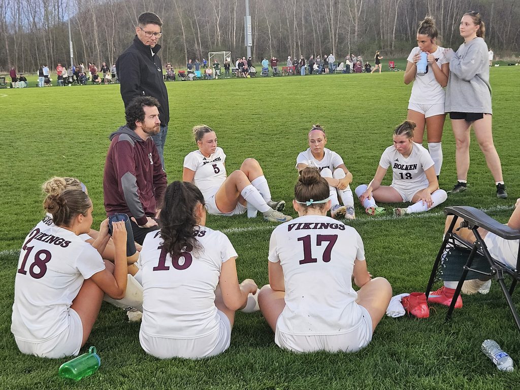 Holmen girls soccer coach Nick Schellenger talks to his team during halftime of a game this season. -- TODD SOMMERFELDT PHOTO