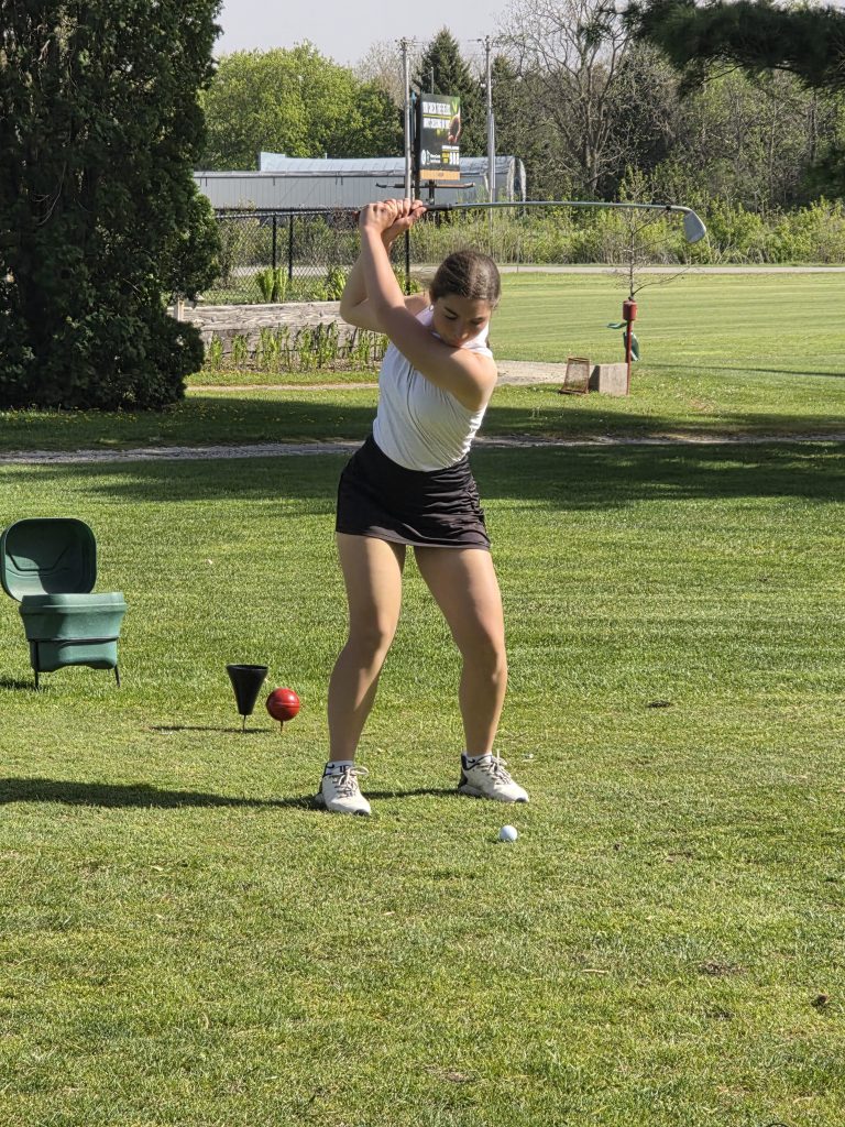 Junior Jazzlyn Hauser takes a swing for Caledonia at Harmony Golf Course on Tuesday. -- SUBMITTED PHOTO