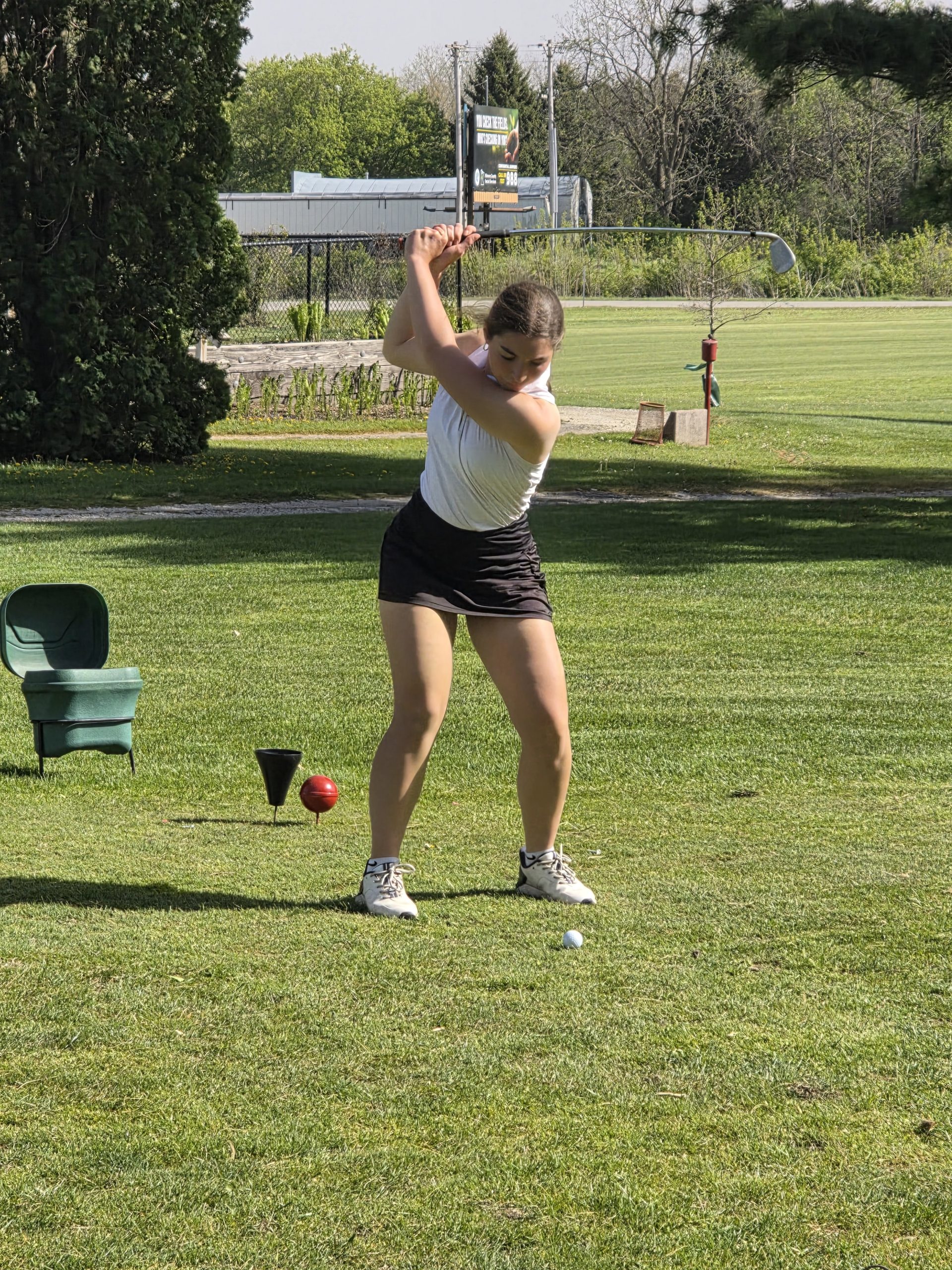 Junior Jazzlyn Hauser takes a swing for Caledonia at Harmony Golf Course on Tuesday. -- SUBMITTED PHOTO