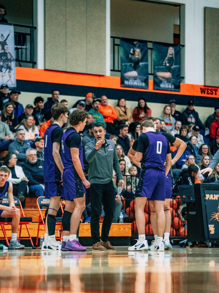 New Onalaska boys basketball coach Isaac Castellano talks to players as an assistant last season. -- ONALASKA HIGH SCHOOL PHOTO