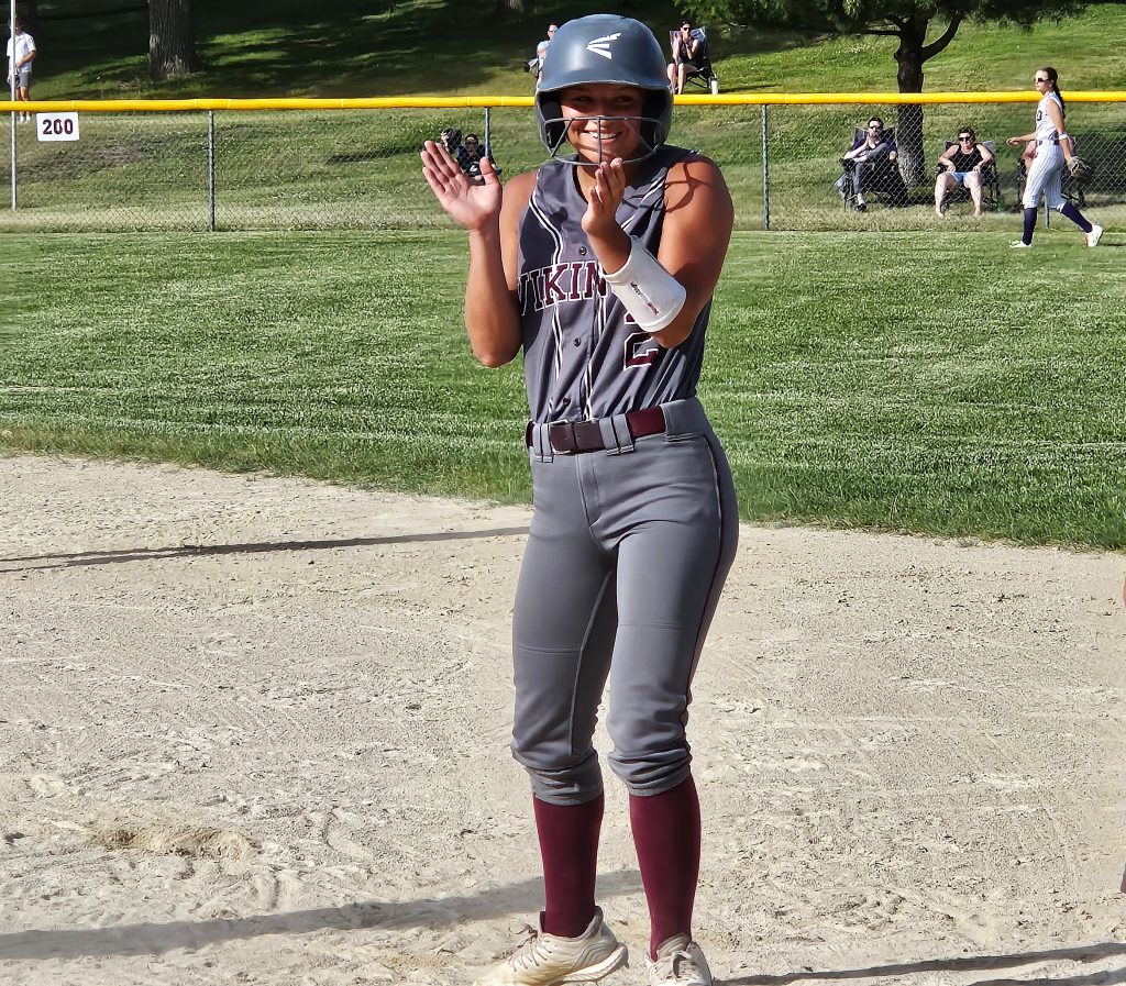 Holmen shortstop Macy Kline smiles after hitting a two-run single in a win over Onalaska on Thursday. -- TODD SOMMERFELDT PHOTO