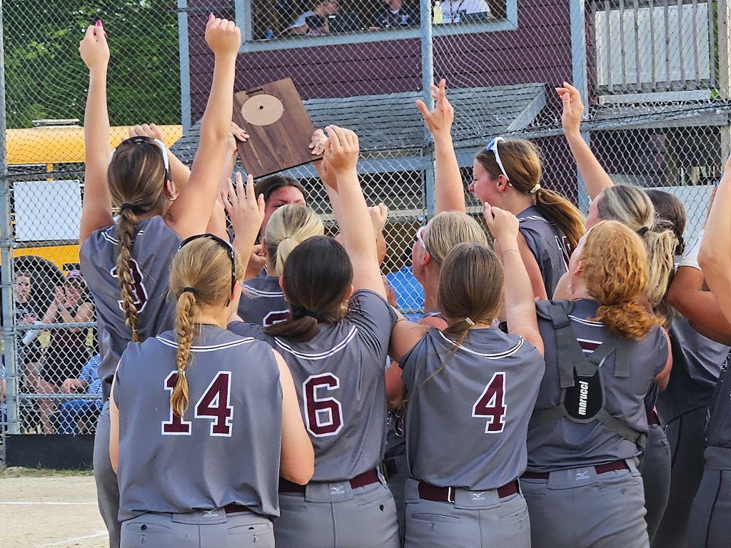 The Holmen softball team celebrates its WIAA Division 1 regional championship. -- TODD SOMMERFELDT PHOTO
