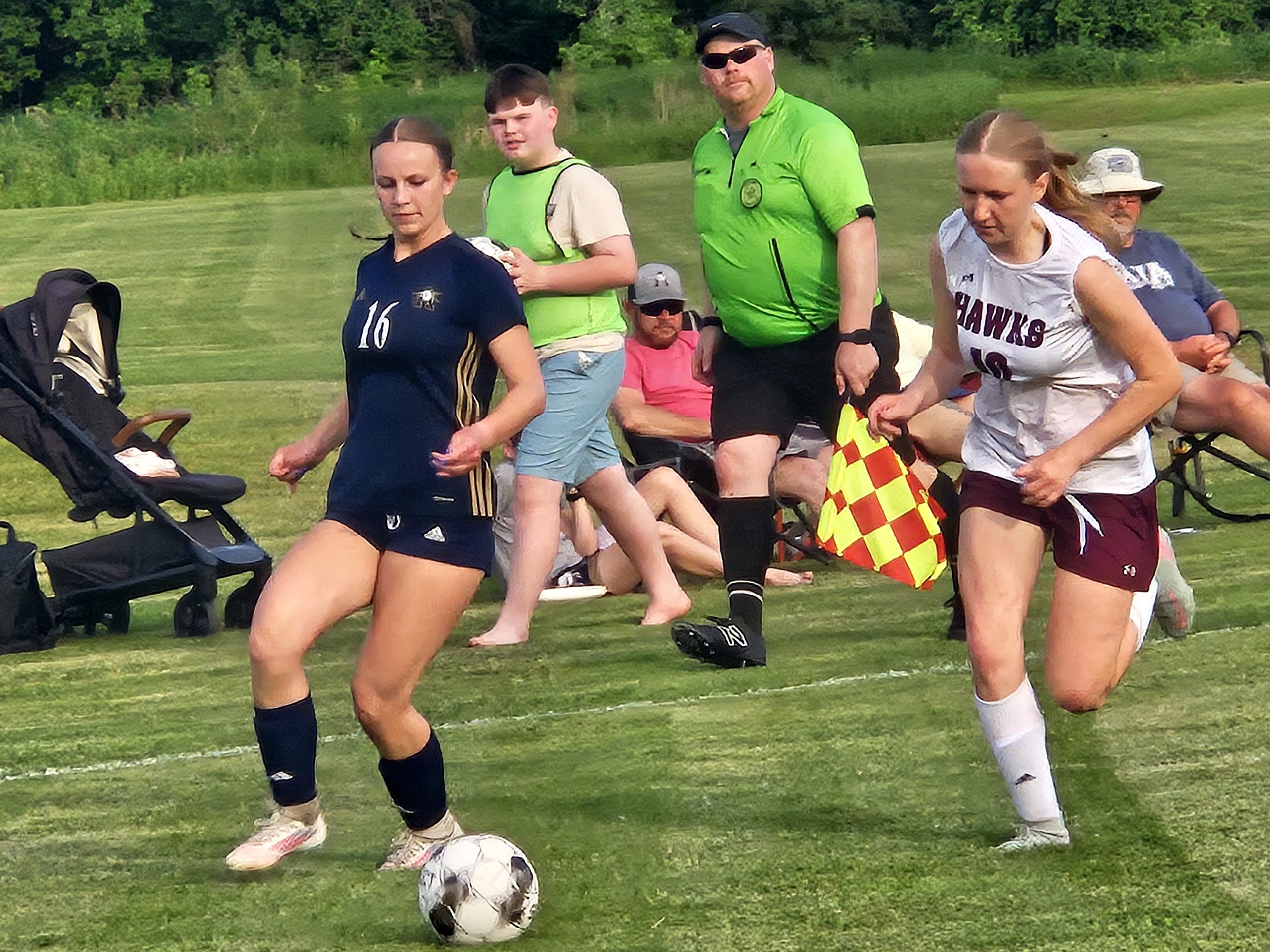 Aquinas sophomore Cecilia Manson chases down the soccer ball during a game against Prairie du Chien on Friday. -- TODD SOMMERFELDT PHOTO