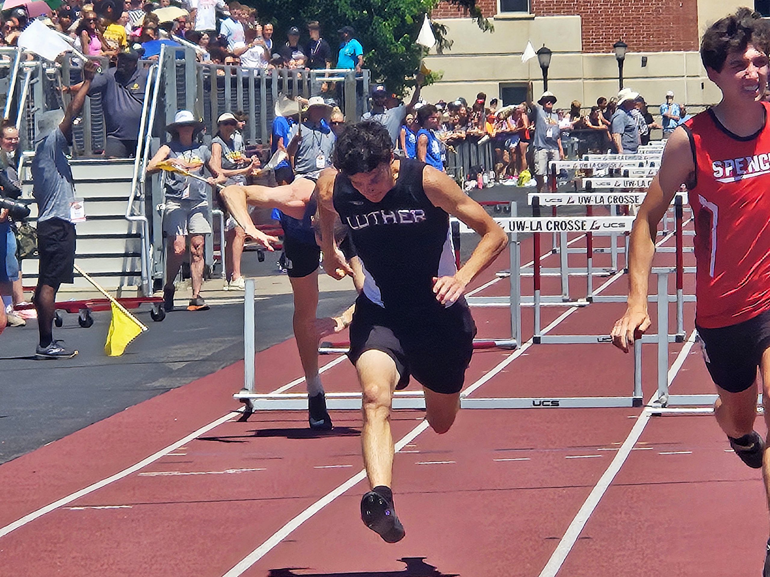 Luther junior Nathan Dobberstein crosses the finish line in the Division 3 110 hurdles on Saturday. -- TODD SOMMERFELDT PHOTO