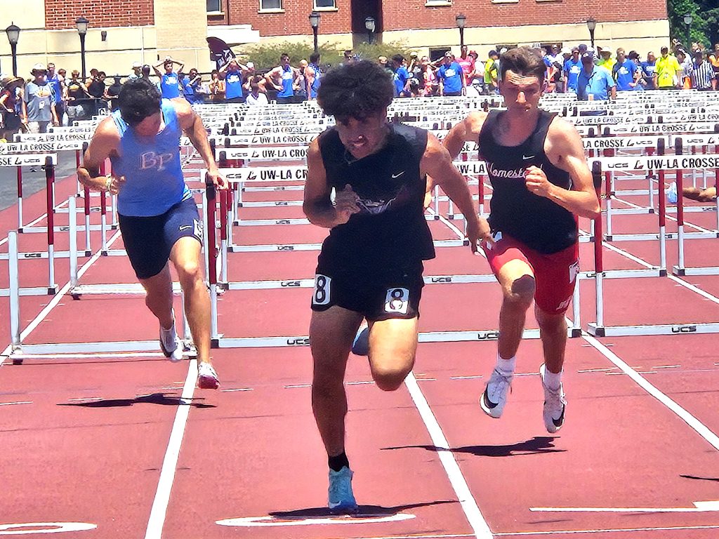 Holmen junior Jakai Ayed won the Division 1 110-meter hurdles Saturday at the state track and field meet. -- TODD SOMMERFELDT PHOTO