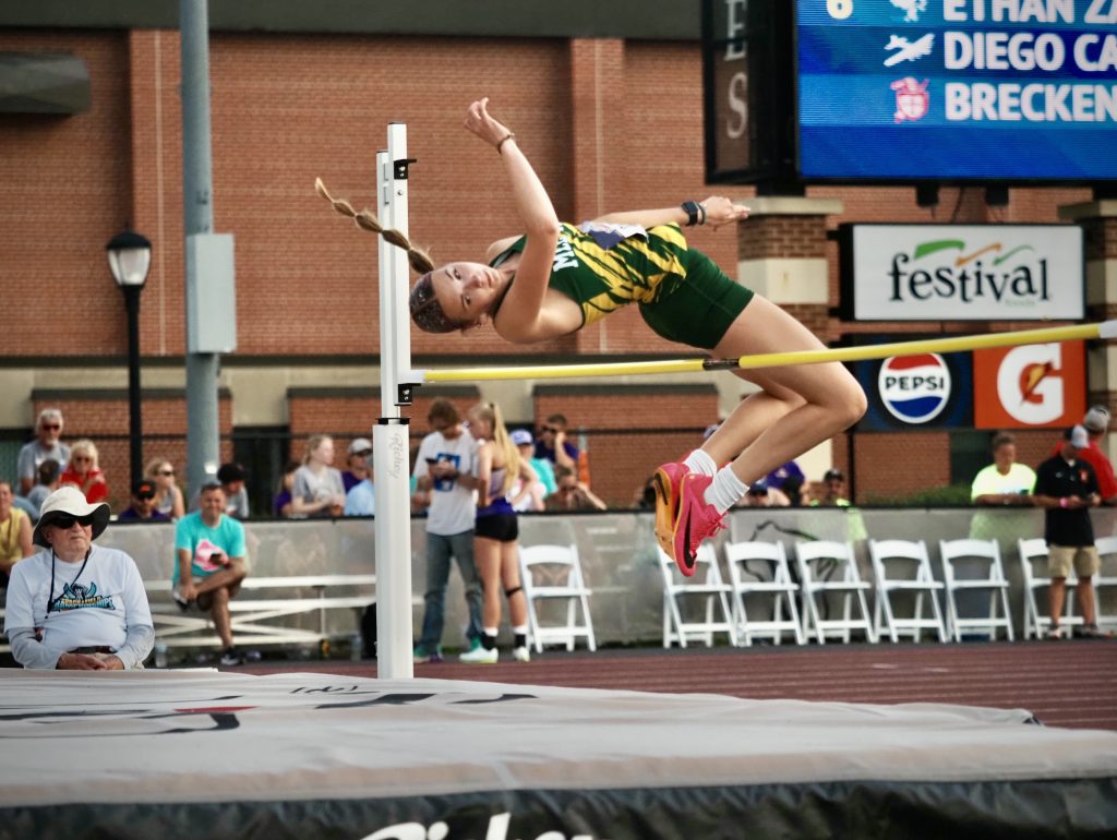 Melrose-Mindoro's Sheila ohnson clears the bar in the Division 3 high jump at the WIAA state track and field meet. -- TARA WALTERS PHOTO