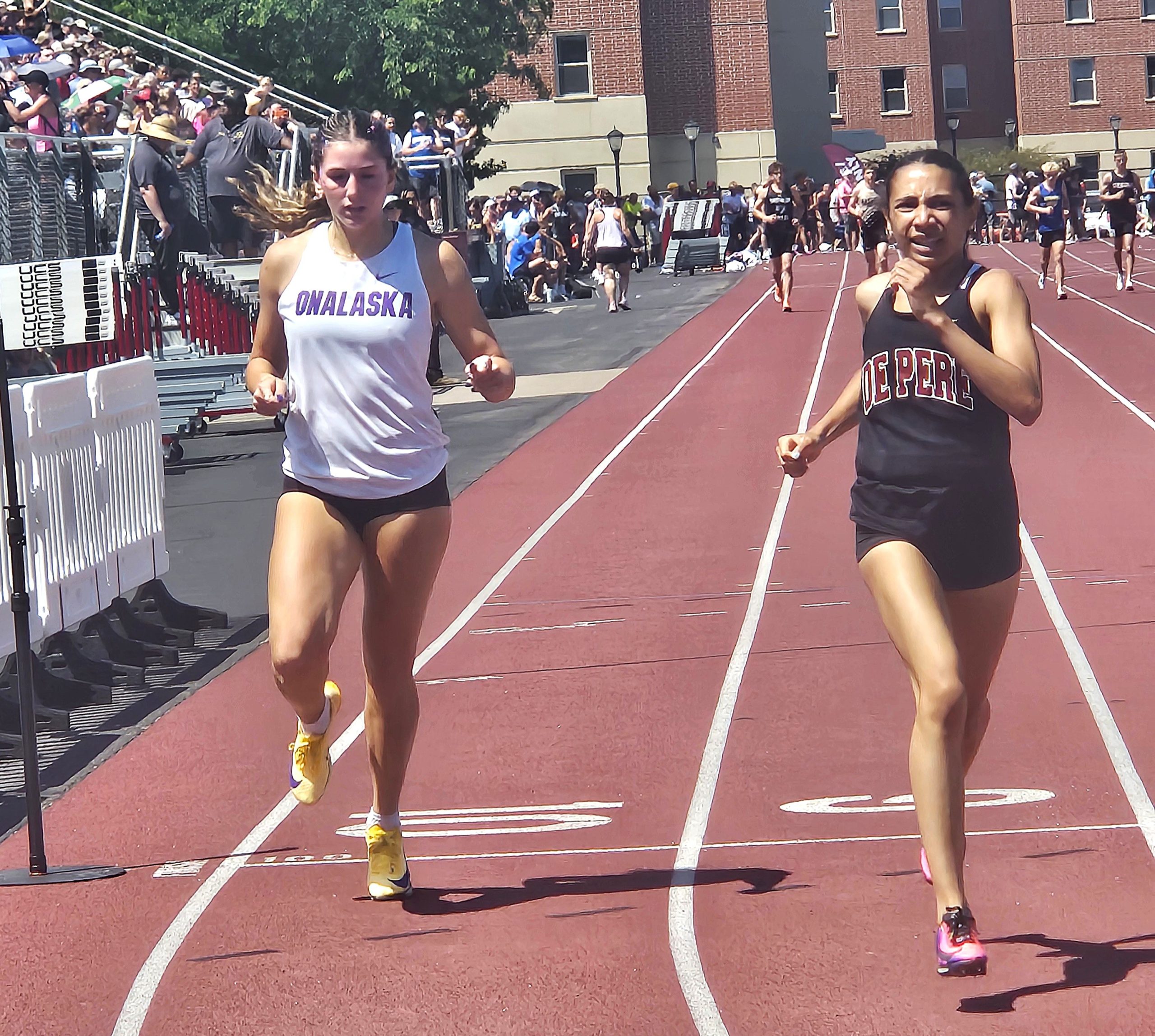 Onalaska senior Isabella Malecek runs the Division 1 400 at the WIAA state track and field meet. -- TODD SOMMERFELDT PHOTO