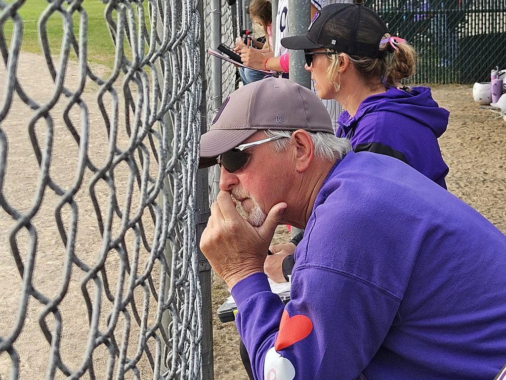 Onalaska coaches Mesa Heit and Tony Kraus watch the Hilltoppers play. -- TODD SOMMERFELDT PHOTO